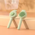 Light green ergonomic pet grooming brush for cats with one-click hair removal feature - 1 Piece / Green