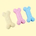 Giocattoli resistenti da masticare in TPR per cani a forma di osso in vari colori - Osso Cavo con Punte TPR / 12cm / Colorato