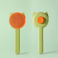 Cute cat-shaped self-cleaning pet grooming brush with steel needles, green and orange color - Cat Ear Design / Green