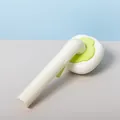Ergonomic pet grooming brush featuring a green flower head and wood grain handle - Bag Packaging / White-Green Persimmon Style