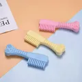 Giocattoli da masticare colorati a forma di osso per cani in rosa, giallo e blu - Massaggiagengive a Forma di Pettine Pieno