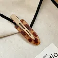 Acryl-Haarklammer mit Leopardenmuster und Schildpatt-Design für ein nahtloses Styling - Braun