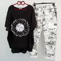 Casual women's two-piece set featuring a sunflower print t-shirt and camouflage pants - 3XL / Top And Bottom / Black Circle Flower Style (134105-6)