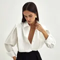 Elegant white cotton French design shirt for women in a professional studio setting - S / Tops / White