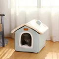 Warm house-shaped cat bed with cozy white fleece roof and soft light blue fabric in a sunny room - L / Pale Green