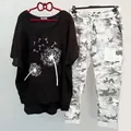 Casual two-piece set for women featuring dandelion print black top and camo pants - 3XL / Top And Bottom / Black White Dandelion Style (134105-7)