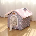 Warm house-shaped cat bed with plush pink roof and grey polka dot pattern in a home setting - S / Grey Pink Dot