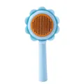 Blue sunflower-shaped pet grooming brush for cat and dog hair removal. - Blue