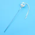 Cat teaser wand with blue pom-pom ball, bell and white streamers on blue background - Tassel Style / Blue