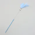 Elegant light blue cat teaser wand featuring soft feathers and bells for interactive play - Feather Style / Blue