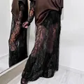 Elegante gonna lunga in pizzo nero trasparente a vita alta per look a strati 2026 - Taglia S / Pantaloni e gonne / Nero