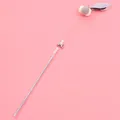 Interactive cat teaser wand toy with pearls bell and feather charms on pink background - Clover Style / Gray