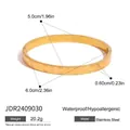Gold heart engraved stainless steel bangle showing precise dimensions and weight information - Heart Engraved Bangle Style (JDR2409030) / Inner Diameter 5.0-6.0cm / Gold