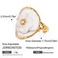 Adjustable gold stainless steel ring featuring an elegant white flower under a clear dome - Dome 3D Flower Rhinestone Adjustable Style (JDRW2407030) / Gold