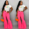 Pantalones acampanados rosa neón ajustados con volantes para moda de club nocturno - Rosa