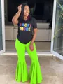 Elegantes pantalones de campana verde neón con espectaculares bajos con volantes - Verde Fluorescente