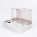 Modern white automatic pet feeder and waterer with translucent pink reservoir - Sakura Pink