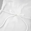 Detailed macro view of an elegant white satin bow tie on a luxury summer dress - S / Top And Bottom / White