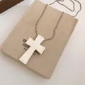 Detail shot of bohemian white leather cross necklace with intricate embossed rose - Rose Embossed Cross (Silver White)