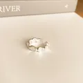 Eleganter silberfarbener Wellenmuster-Ring für Damen, offener französischer Modeschmuck - Mattierter Ovaler Wellen-Stil (3) / Silber
