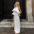 Summer white linen two-piece set with sleeveless ruffle top and wide-leg trousers. - S / Top And Bottom / White