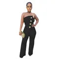 Elegante zwarte strapless jumpsuit met wijde pijpen en grote gouden sierknopen - S / Zwart