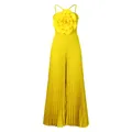 Close-up of a vibrant yellow pleated sleeveless jumpsuit with a 3D floral chest detail - S / Set / Yellow