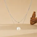 Nahaufnahme einer zweilagigen Edelstahlkette mit einer wunderschönen Süßwasserperle. - D704 Silber Doppelschichtige Perlen Süßwasserperle Halskette / Stahlfarben