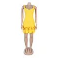 Detailed view of bright yellow stretch bodycon mini dress featuring a ruffled hem design - S / Dresses / Yellow