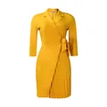 Close-up view of mustard yellow wrap dress with elegant blazer collar and pleated skirt - S / Dresses / Yellow