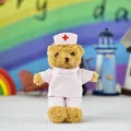 Detailed view of a cute nurse teddy bear plush doll in a pink uniform and hat - Height 13cm (Excl. Rope) / Pink Nurse Brown Bear (Bead Chain)