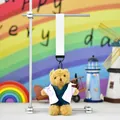 Close-up of a cute teddy bear plush toy dressed in a doctor's white coat and scrubs - Height 13cm (Excl. Rope) / Doctor Brown Bear (Color Rope)