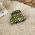 Detailed view of olive green acrylic hair claw clip with white polka dots. - Polka Dot Small Curved Style (2#) / Green