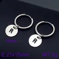 Minimalist silver stainless steel hoop earrings featuring an initial R circular charm - Initial R Disc Style (KE96671-Z) / Silver