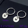 Stainless steel hoop earrings featuring a round charm with the letter 'W' in silver - Initial W Disc Style (KE96676-Z) / Silver