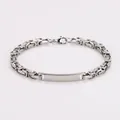 Macro view of stainless steel Byzantine chain bracelet with smooth engraving plate - Byzantine Curved Plate Style (AML029142) / 5mm*22cm / Steel