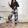 Two-piece black long-sleeved pajama set for women featuring floral print pants - S / Top And Bottom / Black