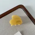 Pinza de pelo de acetato amarillo con forma de corazón y texto France Handmade - Amarillo