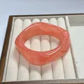 Elegant pink marbled resin bangle for women featuring a smooth curved geometric design - Rhombus Style / Inner Diameter 65mm / Brushed Neon Orange