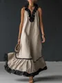 Elegante abito lungo senza maniche con scollo a V a balze in lino beige con bordi neri. - Albicocca