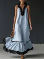 Abito lungo elegante celeste senza maniche con volant neri mostrato in movimento - Taglia S / Vestiti / Azzurro