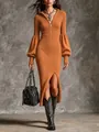 Close-up detail of an orange ribbed knit dress featuring lantern sleeves and half zip - Orange / S