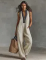 Beige linen blend sleeveless jumpsuit with embroidered stand collar and zipper detail - S / Jumpsuits / White