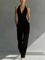 Detailansicht des eleganten schwarzen Neckholder-Tops und der High-Waist-Hose. - S / Oberteil Und Unterteil / Schwarz