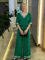 Élégant ensemble deux pièces vert émeraude avec garniture en perles argentées sur modèle - S / Haut Et Bas / Vert