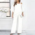 Elegant white two-piece set featuring asymmetrical ruffled top and fluid wide-leg pants. - S / Top And Bottom / White