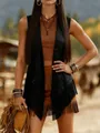 Detailed view of the black bohemian fringe vest with intricate hollow-out patterns. - S / Tops / Black