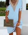Detail of light blue summer dress featuring a lace V-neck and decorative bow-tie split sleeves - 3XL / Dresses / Light Blue