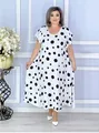 Plus size summer dress featuring a bold black polka dot pattern and flutter sleeves. - S / Dresses / White