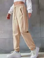 Casual beige women's drawstring jogger sweatpants with elastic waist and ribbed cuffs - 3XL / Bottoms / Apricot